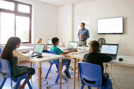 teacher using technology in the classroom teacher using technology in the classroom