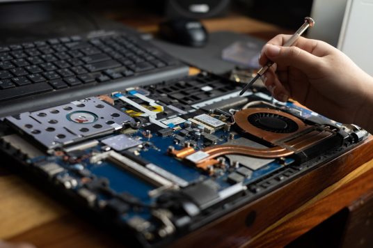 laptop being fixed laptop being fixed